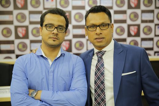 Mahabir with Eric Benny, India's Commonwealth Games football coach, in 2013